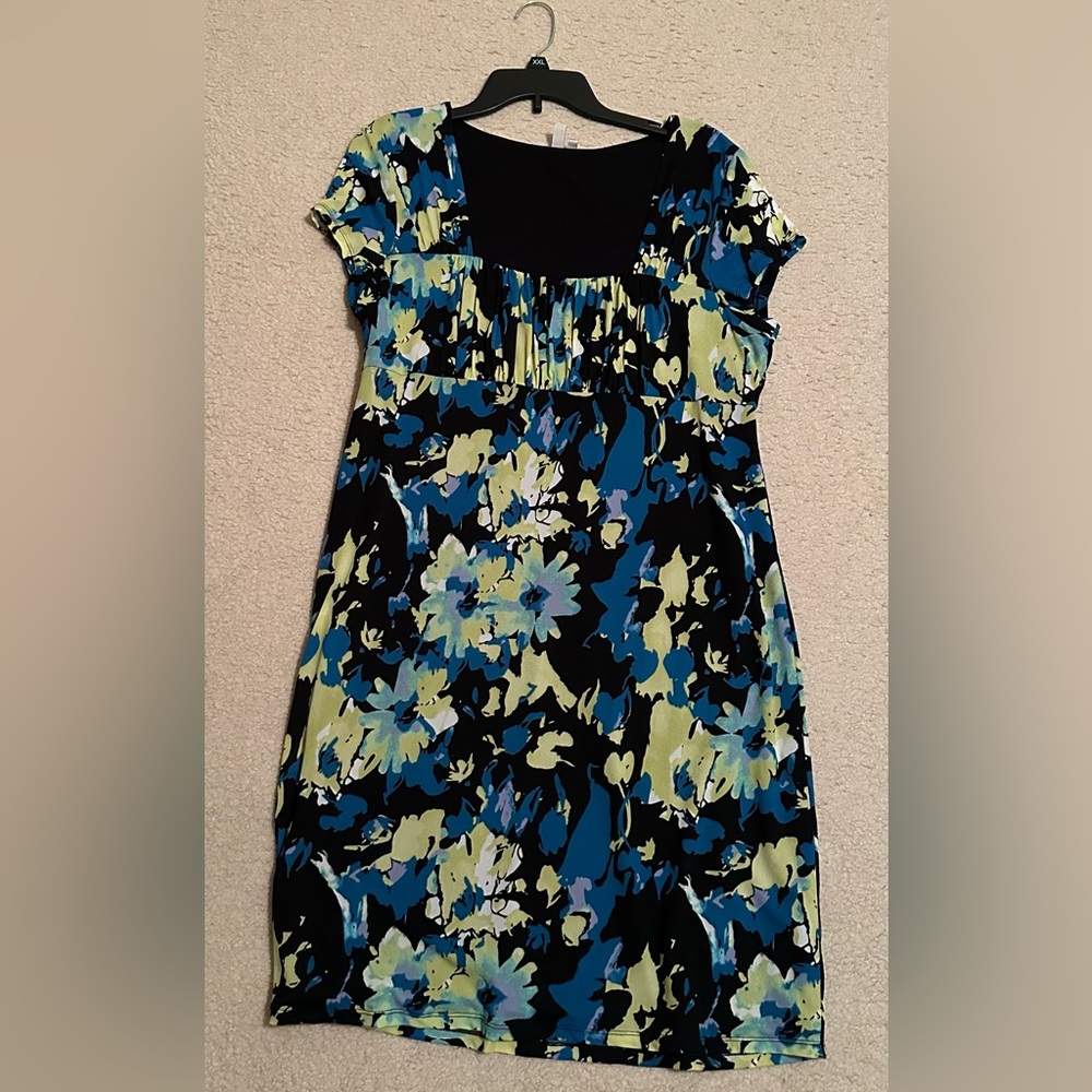 Lightweight lined dress with blue and pale green flowers on a black background.